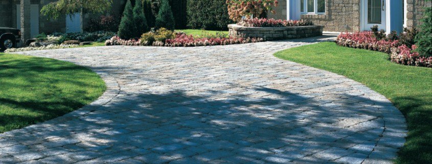 White Columns and Paving Stone Driveway