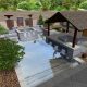 pool with paving stone walkway and landscaping design