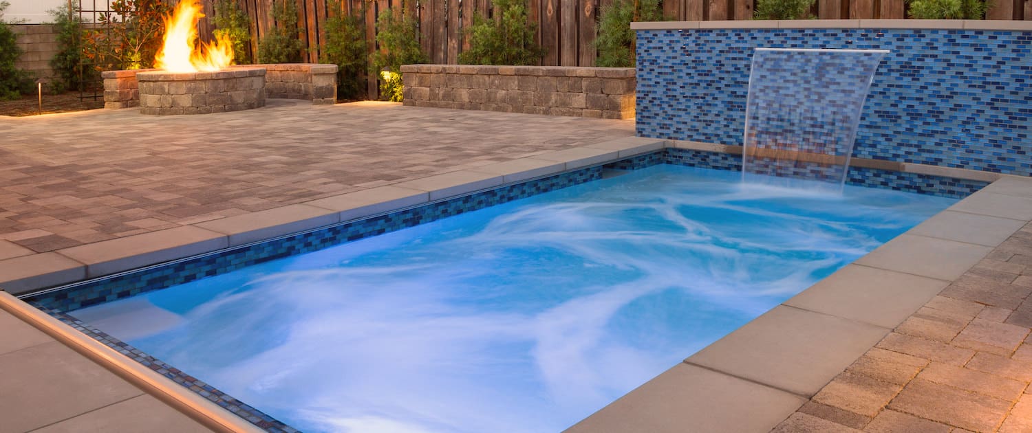 Pool Deck design made with water fall feature