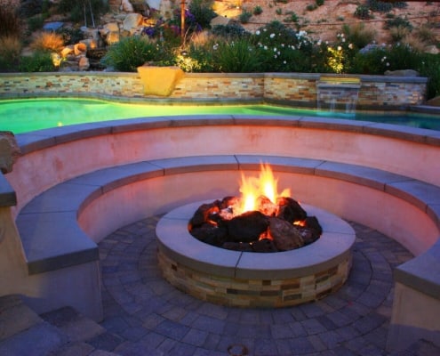fire pit seating in circular design at night