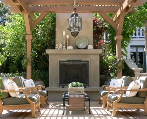 outdoor fireplace and pergola